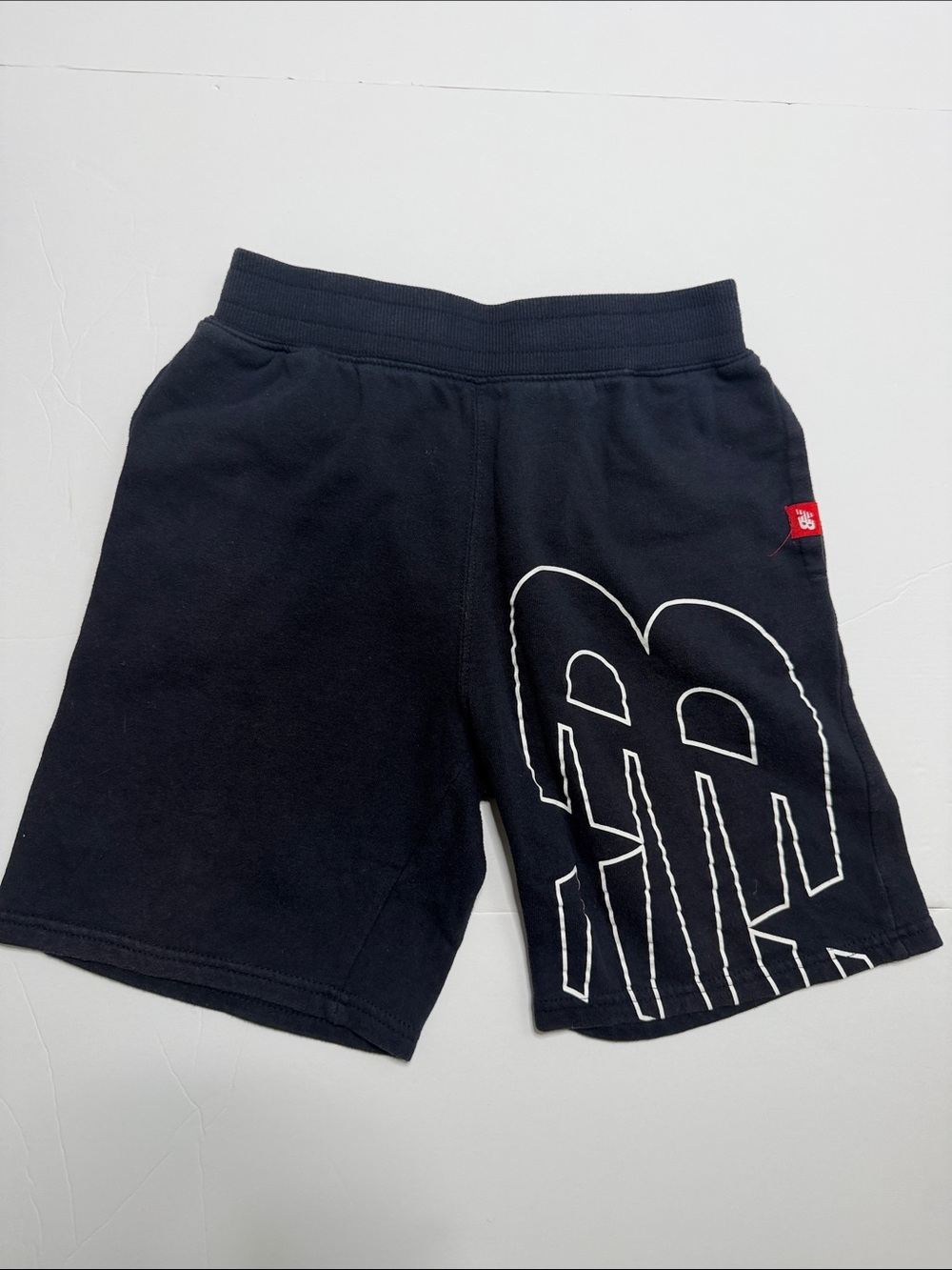New Balancenavy kids Athletic Shorts with White Graphic